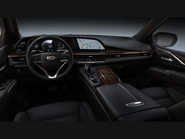 Cadillac Escalade executive interior — curved display and leather cabin