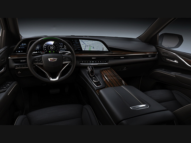 Cadillac Escalade executive interior — curved display and leather cabin